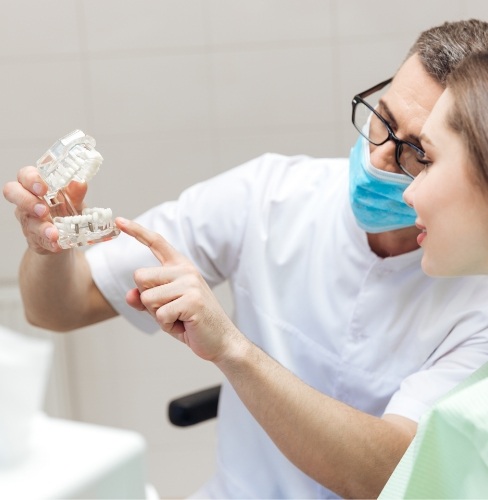 woman talking with dentist